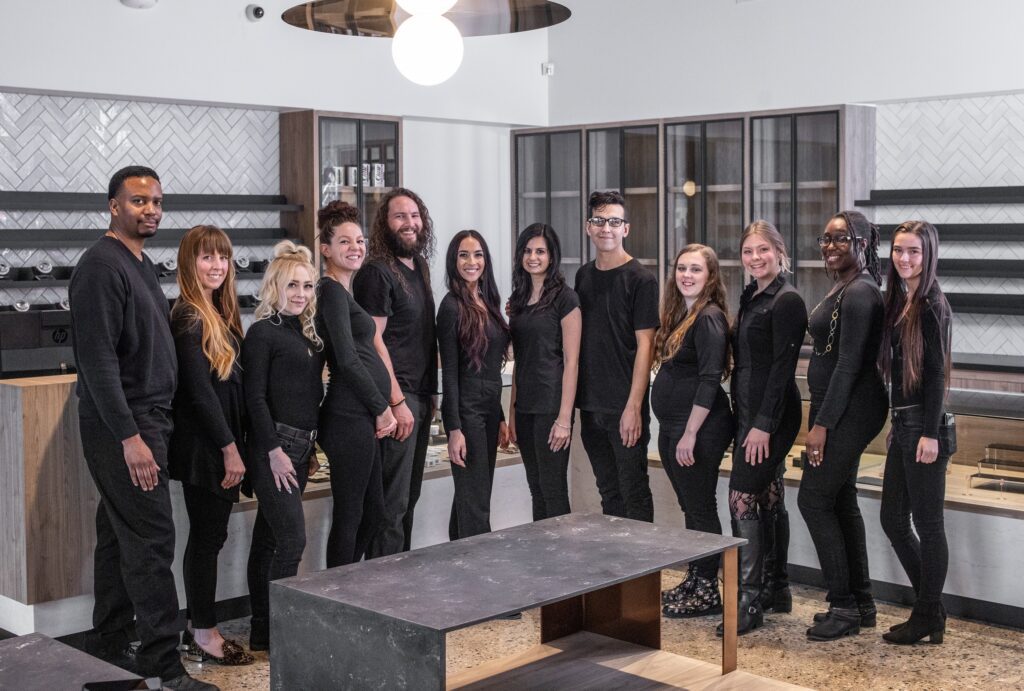 Fluresh Cannabis Advisers team standing inside the Grand Rapids dispensary showroom